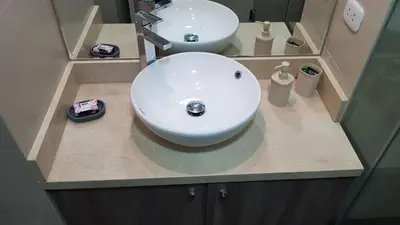 a bathroom with a white sink and a mirror at Barranco Best Location - Apartment wAC in Lima