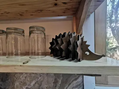 a wooden object on a shelf with glass jars at La casa del Erizo in Oxapampa