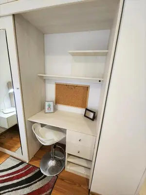 a small office with a desk and a chair at Bright 1BR close to boulevard in Lima