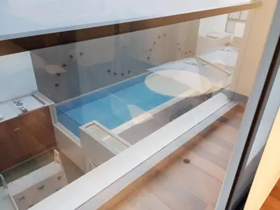 a view of a glass floor in a room at EL PRAT Luxury Aparment Lima Peru in Lima