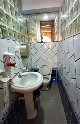 a bathroom with a sink and a toilet at Carlos Guest House 2 Cusco in Cusco