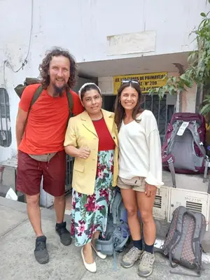 a group of three people posing for a picture at Posada Ternura in Lima