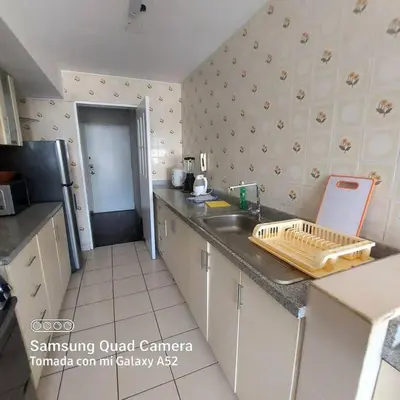 a kitchen with a sink and a counter top at APARTAMENTO 502 in Lima
