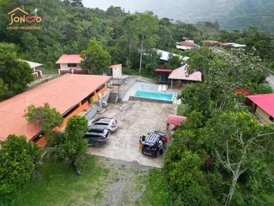 an aerial view of a house with a car parked in front at SONCCO LODGE-RESTAURANT in Quillabamba