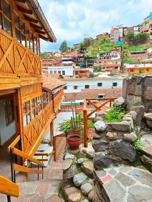 a balcony of a house with a view of a city at Andenes del Sol in Cusco