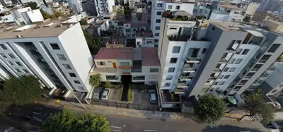 an overhead view of a city with tall buildings at Habitación con baño propio para 2 personas como máximo in Lima