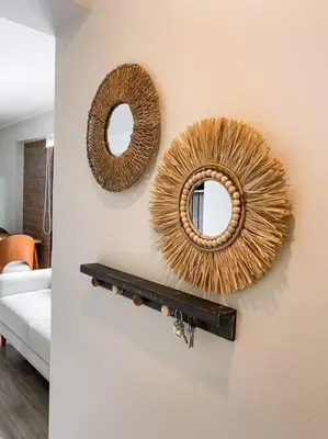 two mirrors on a wall in a living room at Miraflores House C&F in Lima