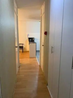 a hallway of an apartment with a kitchen and a hallwayngthngthngthngthngth at 807. Departamento entero en Chorrillos in Lima