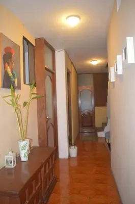 a hallway of a house with a room with a hallway at ROOM Lima House centro in Lima