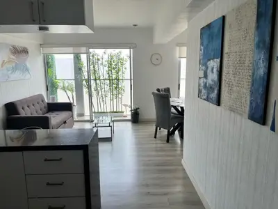 a living room with a couch and a table at Big Apartment 2 rooms next to Miraflores in Lima
