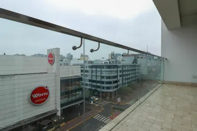 a view from the balcony of a building at Sky Balta in Miraflores by Wynwood House in Lima