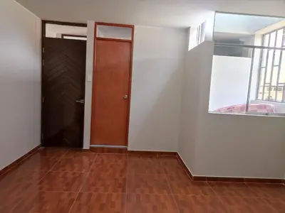 an empty room with a door and a window at Casa Alojamiento Virreynal in San Ramón