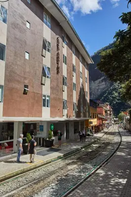 a group of people standing outside of a building at Casa Andina Standard Machu Picchu in Machu Picchu