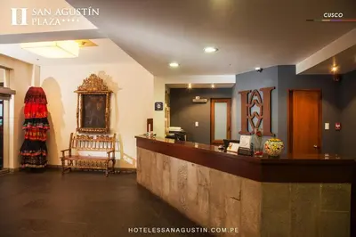 a lobby of a hotel with a reception counter at San Agustin Plaza in Cusco