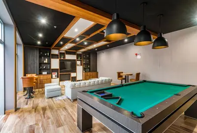 a living room with a pool table in it at Departamento de Estreno en Barranco in Lima