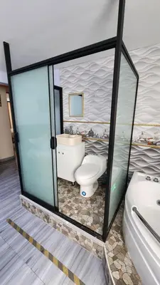 a bathroom with a toilet and a sink at TRANSFER VIP HOSTEL in Lima