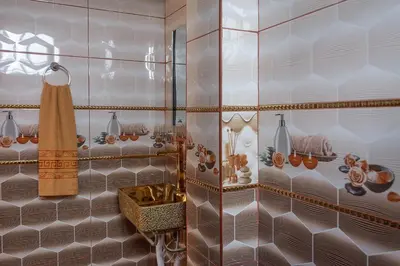 a bathroom with a sink and a mirror at TRANSFER VIP HOSTEL in Lima