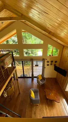 an overhead view of a living room in a cabin at Oasis Blue Oxapampa in Palmira
