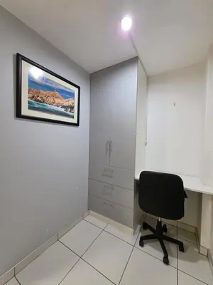 an office with a chair and a picture on the wall at Hotel Real San Pedro in El Puente