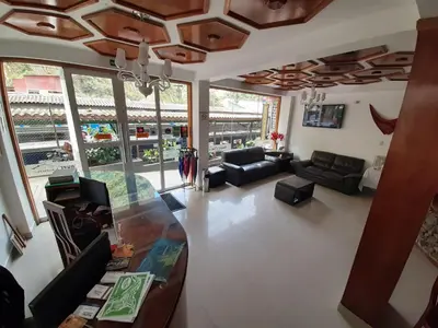 an overhead view of a living room with a coffered ceiling at Flower's House MachuPicchu in Machu Picchu