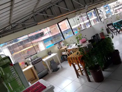 an overhead view of a restaurant with tables and windows at Inca Town In in Cusco
