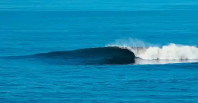 a wave in the middle of the ocean at Almar Punta Hermosa in Punta Hermosa