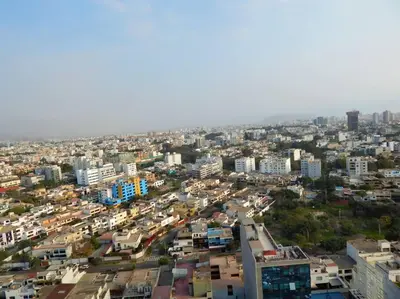 an aerial view of a city with buildings at Loft de estreno, San Borja, muy centrico in Lima