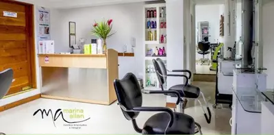 a salon with chairs and a counter in a room at Adri s House in Lima