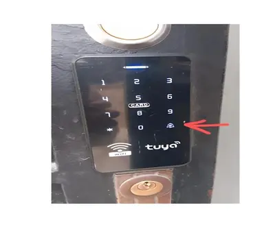 a close up of a remote control with a red arrow at Peruvian Apartment in Lima