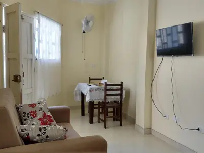 a living room with a couch and a table at LA CASA DE LA ABUELA in Barranca