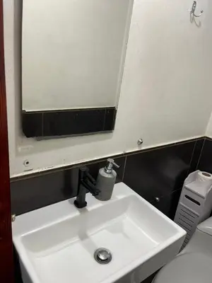a bathroom with a sink and a mirror at HOME BLESSED II in Lima