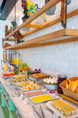 a buffet line with many different types of food at Hotel San Blas in Lima