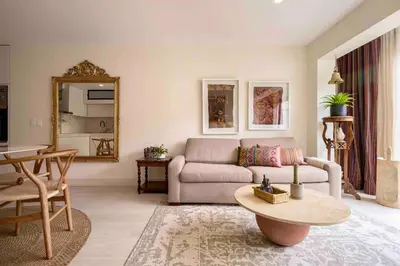 a living room with a couch and a table at * Casma Residence * Private Terrace & Grill & HVAC in Lima
