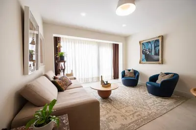 a living room with a couch and two chairs at * Casma Residence * Private Terrace & Grill & HVAC in Lima