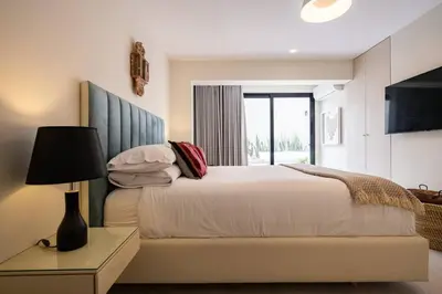 a bedroom with a large bed and a window at * Casma Residence * Private Terrace & Grill & HVAC in Lima