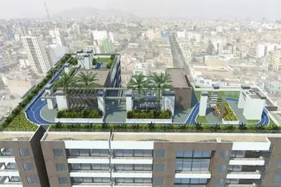 an aerial view of a building with plants on the roof at Apartment near to MIRAFLORES, BEACHES & REBAGLIATI HOSPITAL ! Panoramic View,Pool, Gym,Private Park in LINCE in Lima