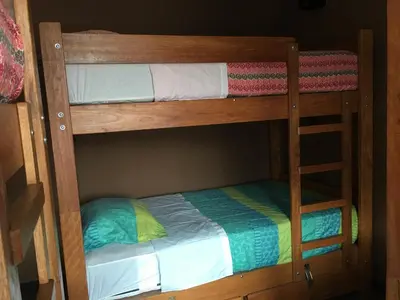 a couple of bunk beds in a room at Tupac Lima Airport in Lima