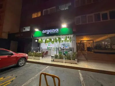 a car parked in a parking lot in front of a building at Departamento en el corazón de Miraflores in Lima