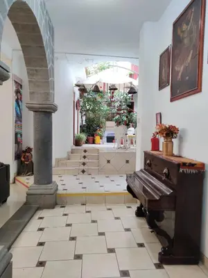 a hallway with a bench in a building at Hotel San Francisco de Paula Ayacucho in Ayacucho