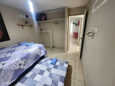a hospital room with a bed and a hallway at rodrich business apartment in Lima
