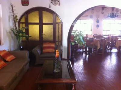 a living room with a couch and a table at Oro Viejo in Nazca