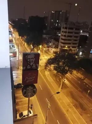 a view of a city street at night at Mini departamento lujo in Lima