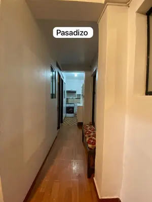 a hallway of a room with a sign that reads pasadena at Casa Katya Cusco in Cusco