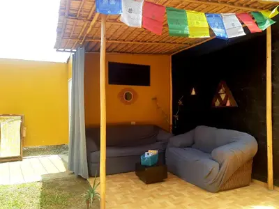 a room with a couch under a tent at Casa - Hospedaje Munay Ki - Yoga - in Pisco