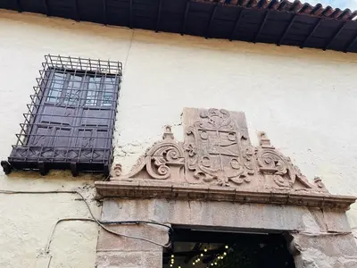 a building with a window on the side of it at Casa Virgen del Carmen in Cusco