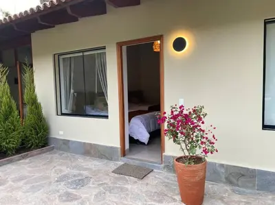 a house with a door leading to a bedroom at FUNDO VIERA: Amplio y acogedor in Lima