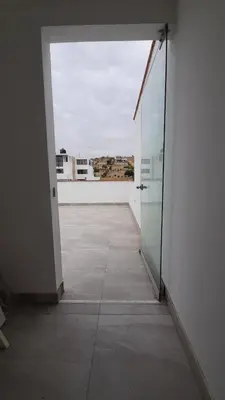 an empty room with an open door to a building at CASA DE PLAYA Durante todo el año in Punta Negra