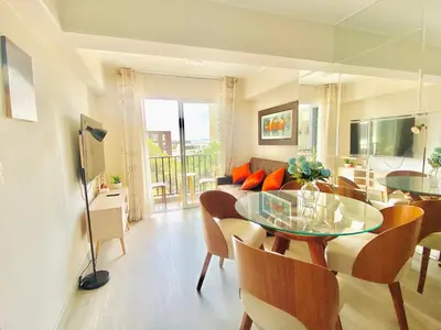 a living room with a glass table and a couch at Beautiful floor 9th apartment Pool Gym Barranco in Lima