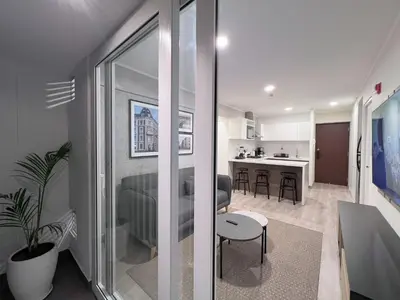 a living room and kitchen in a apartment at Peruvian Apartments Miraflores in Lima