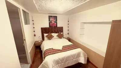 a bedroom with a bed in a room at Casona Libertrek Inn in Cusco